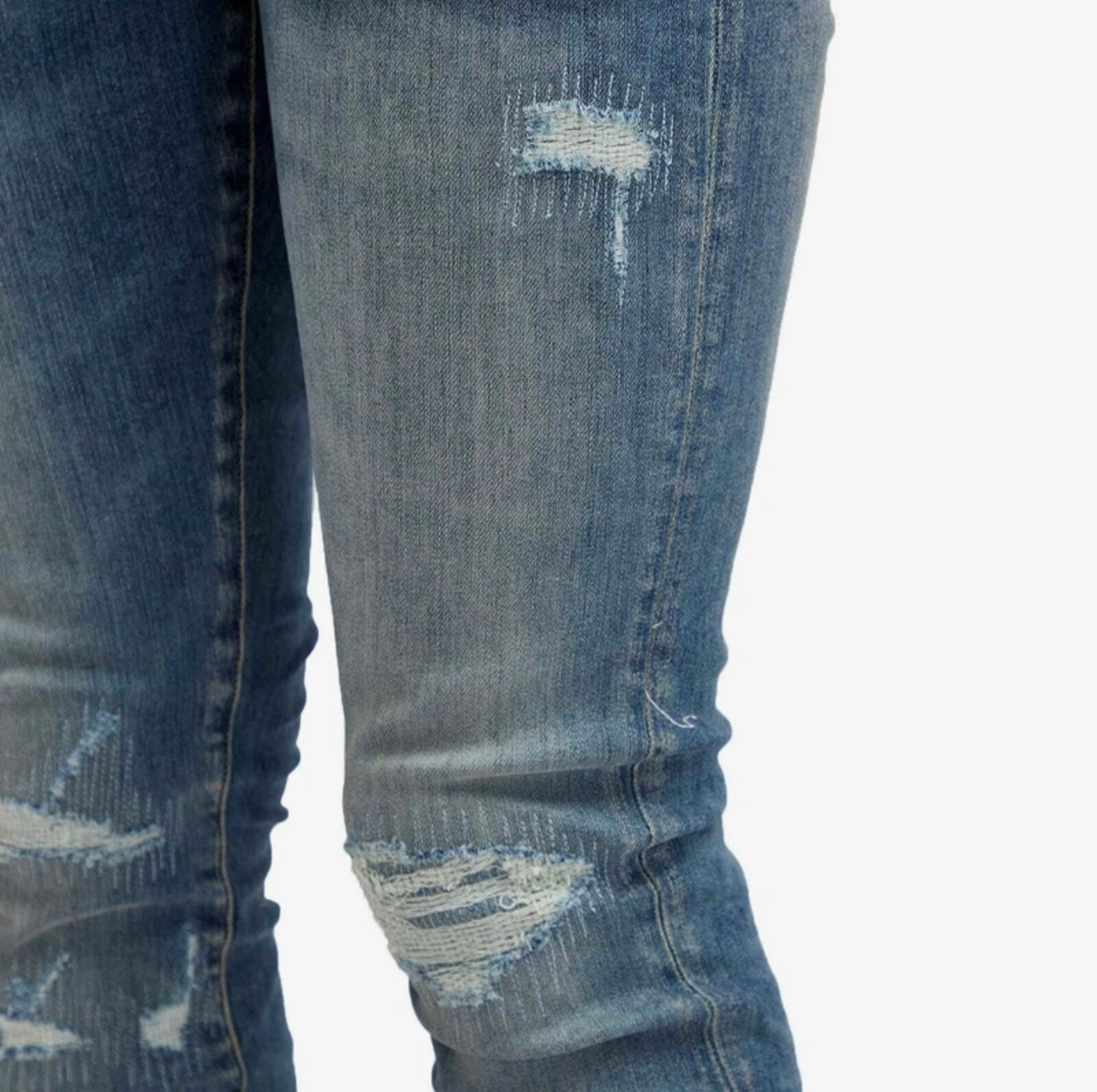 Amiri aged indigo fractured distressed jeans