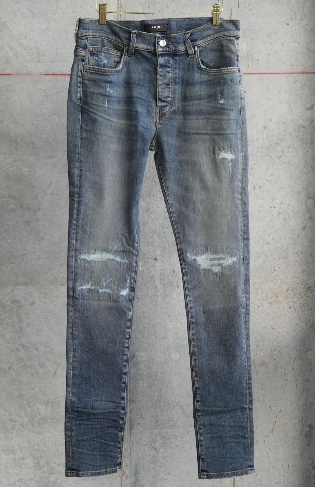 Amiri aged indigo fractured distressed jeans