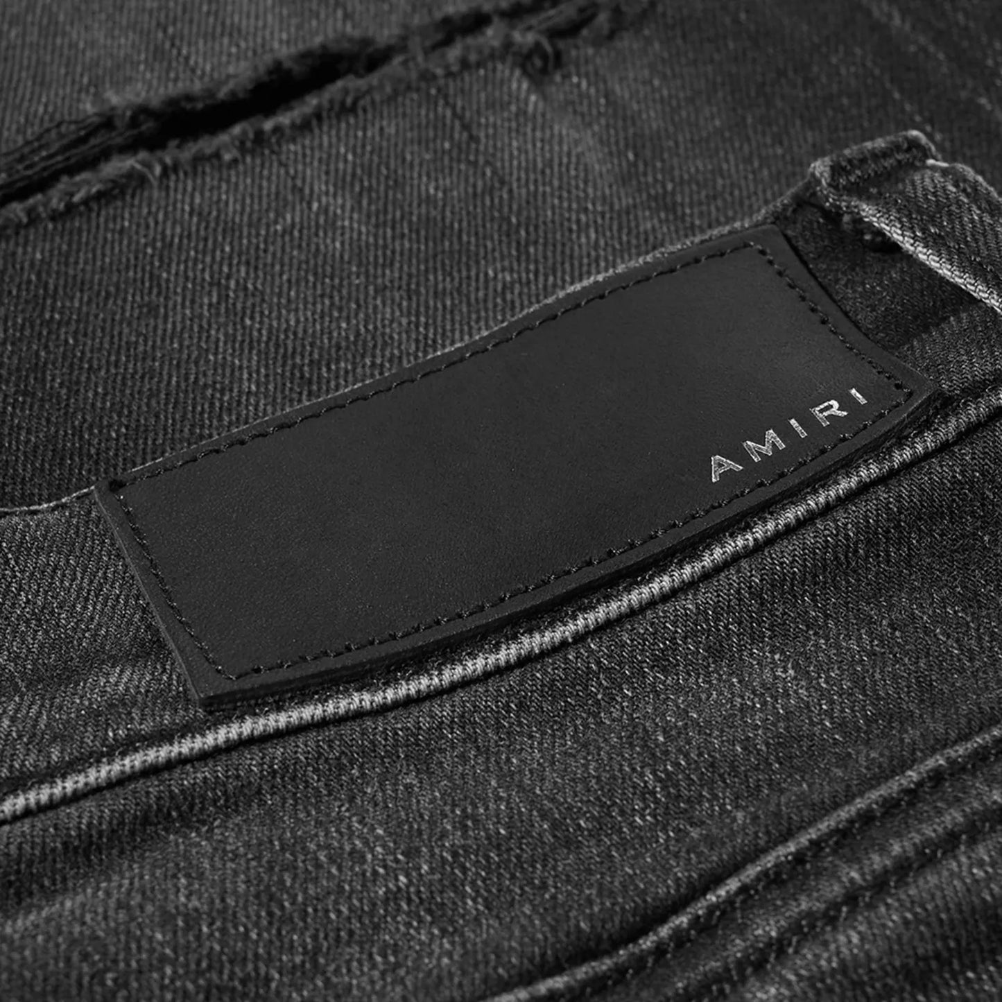 Amiri aged slash distressed jeans - Black