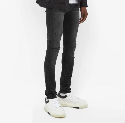 Amiri aged slash distressed jeans - Black